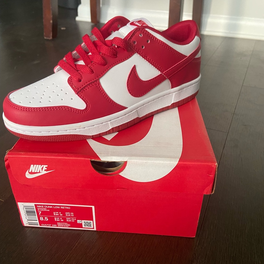 Red Nike dunks low. Fits a womens 8.5 perfectly
